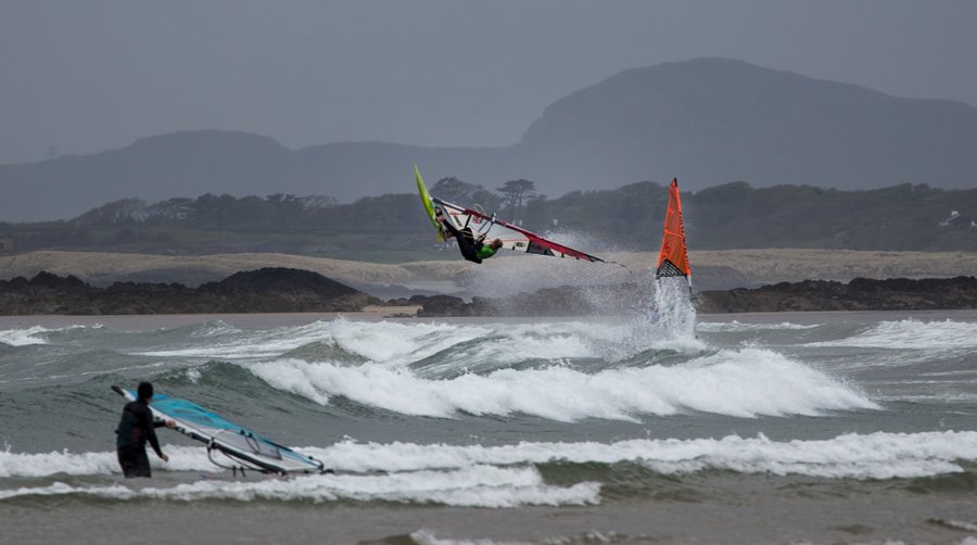 Windsurfers in the surf